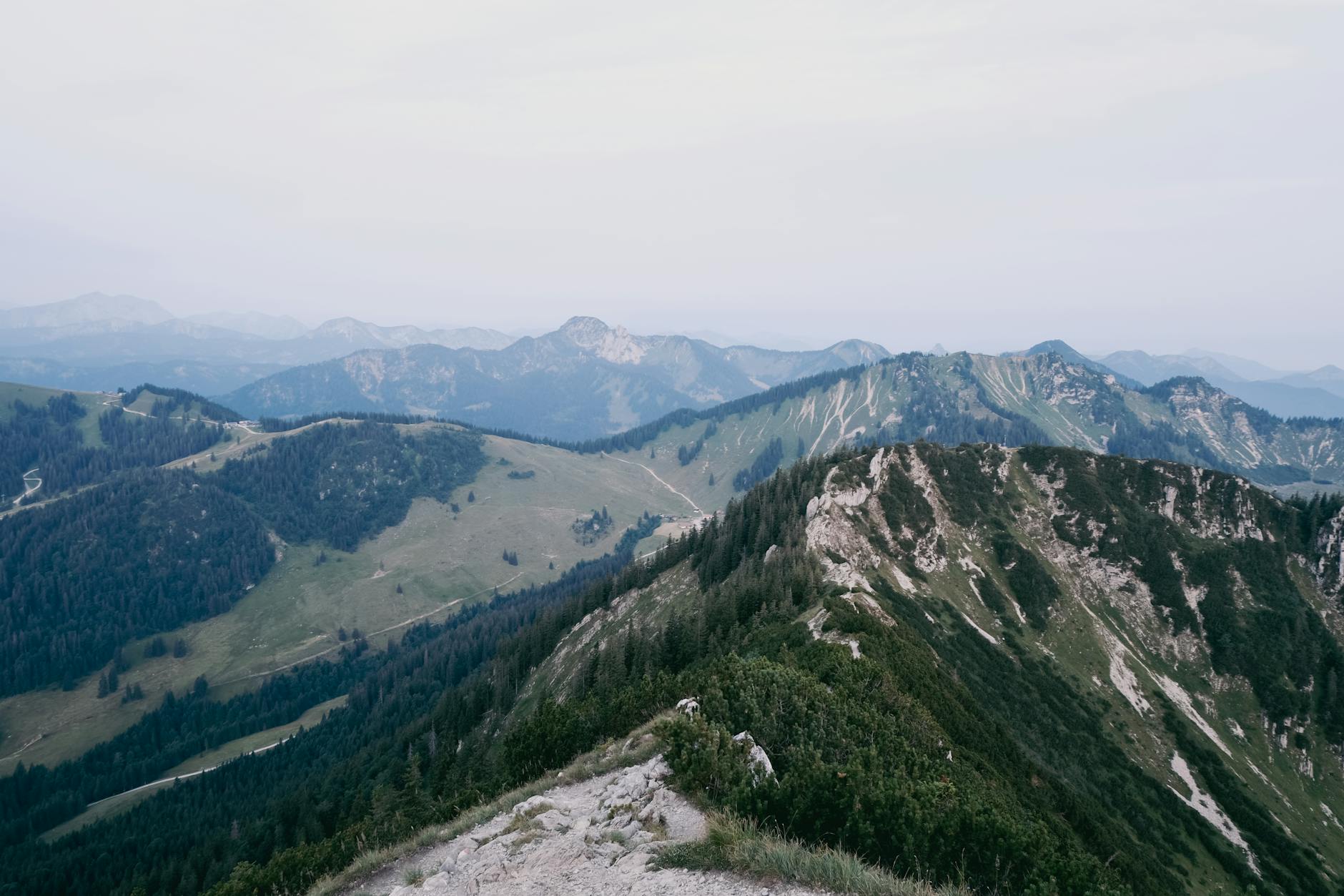 Scenic view of lush green Bavarian Alps in summer near Kempten, Germany.